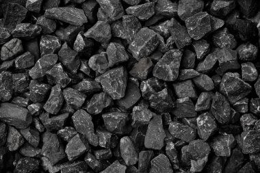 Arka plan tasarımı için doğal siyah kömür. Endüstriyel kömür. Yeryüzündeki volkanik kaya enerjisi.