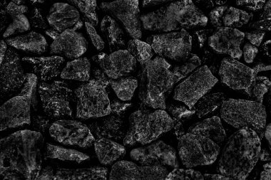 Arka plan için doğal siyah kömür. Endüstriyel kömür. Volkanik kaya arkaplan tasarımı.