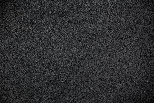 Soyut asfalt yol dokusu. Arkaplan için asfalt yol yüzeyi