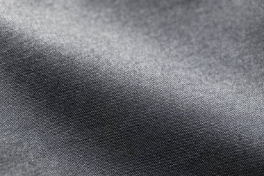 Canvas Polyester texture synthetical for background. Black polyester fabric textile backdrop for interior art design or add text message.