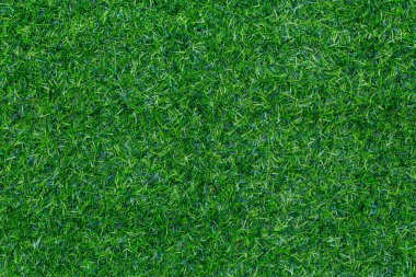 Golf sahası için yeşil çimen dokusu, futbol sahası ya da spor geçmişi. Metin veya resim eklemek için kopyalama alanı olan tasarım için yapay yeşil çimlerin tasarımını kavra.