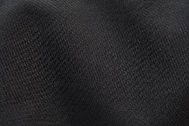 Canvas Polyester texture synthetical for background. Black polyester fabric textile backdrop for interior art design or add text message.