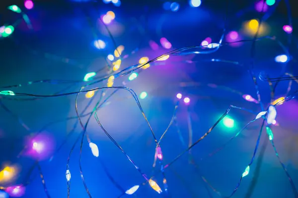 Selective focus of LED electric wire colorful light. Backdrop of Merry Christmas and Happy new year background for design text message.