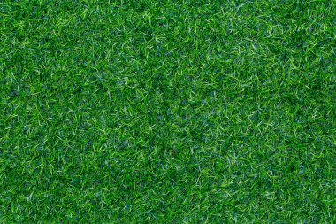 Golf sahası için yeşil çimen dokusu, futbol sahası ya da spor geçmişi. Metin veya resim eklemek için kopyalama alanı olan tasarım için yapay yeşil çimlerin tasarımını kavra.