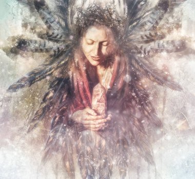 Beautiful shaman woman in nature and ceremony of the earth. Woman holding a large crystal of rosary in her hands clipart