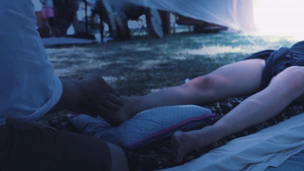 Male Masseur Massages Legs Beautiful White Ornamrental Tent — Video Stock