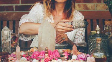 beautiful altar with crystals and rose flowers