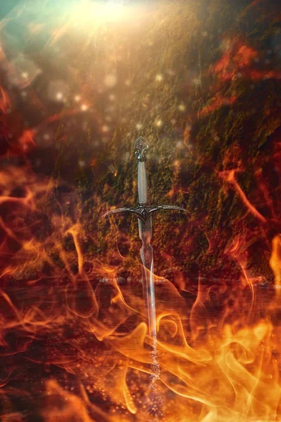 Magic sword on fire background.