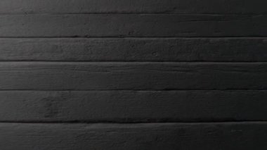 Seamless looped animation of a rough wooden floor. 4K video is a 3d rendering
