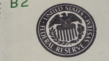 Federal Rezerv amblemi ABD ekonomisindeki önemli parasal otoritesini ve etkisini sembolize eder. 4K canlandırması