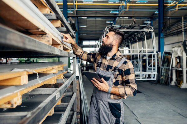 Industry Worker Checking Inventory Tablet Factory Stock Picture