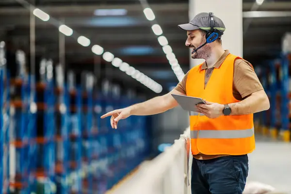 Storage Manager Pointing Navigates Freight Height Stock Photo
