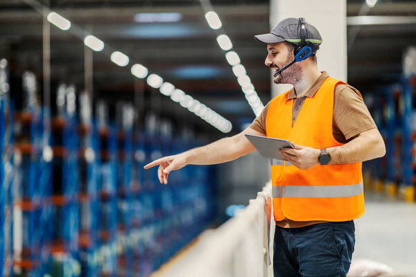 Storage Manager Pointing Navigates Freight Height Stock Picture