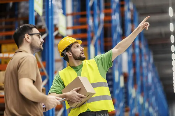 Warehouseman Holds Box Hands Showing Orders His Superior — Stock Photo, Image