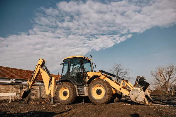 Backhoe Removing Earth Construction Site — Stock Photo, Image