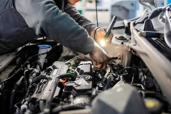 Close Hands Doing Car Checkup Flashlight Hood Mechanic Garage — Stock Photo, Image