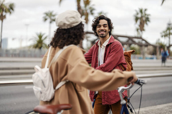 Friends with bicycles are meeting on the street. — Stock Image Friends Bicycles Meeting Street Stock Image