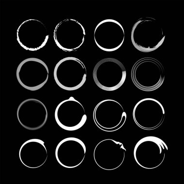 Siyah arkaplanda soyut beyaz çemberler kümesi.