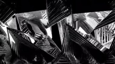 Nirengi dijital görsel animasyon. Başlıklarda, sunumlarda veya VJ kullanımında kullanmak için ideal döngüsüz renksiz geometrik patlayıcı etkisi görüntüsü. 