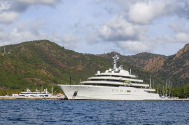Luxury super yacht moored alongside in marina. Motor yacht. Large mega yacht. Yachting concept.