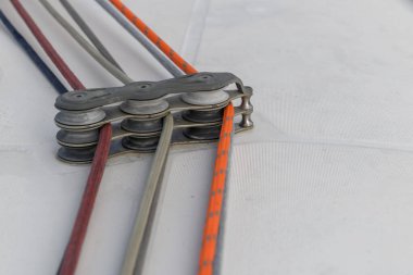 Yacht rollers with three ropes on sailing boat. Yachting concept.