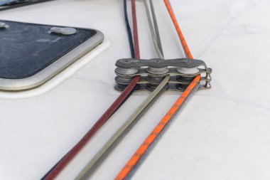 Yacht rollers with three ropes on sailing boat. Yachting concept.