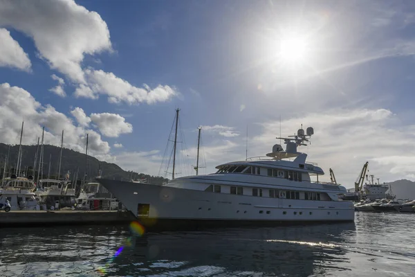 Luxury super yacht moored alongside in marina. Motor yacht. Yachting concept.