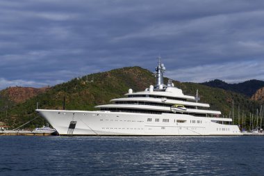 Luxury super yacht moored alongside in marina. Motor yacht. Large mega yacht. Yachting concept.