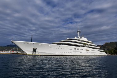 Luxury super yacht moored alongside in marina. Motor yacht. Large mega yacht. Yachting concept.