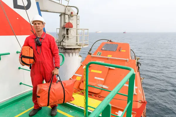 Seaman Wearing Lifejacket Vhf Radio Muster Station Abandon Ship Drill Stock Photo