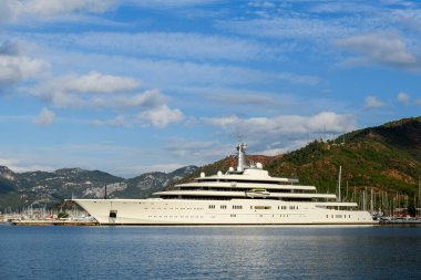 Luxury super yacht moored alongside in marina. Motor yacht. Large mega yacht. Yachting concept.