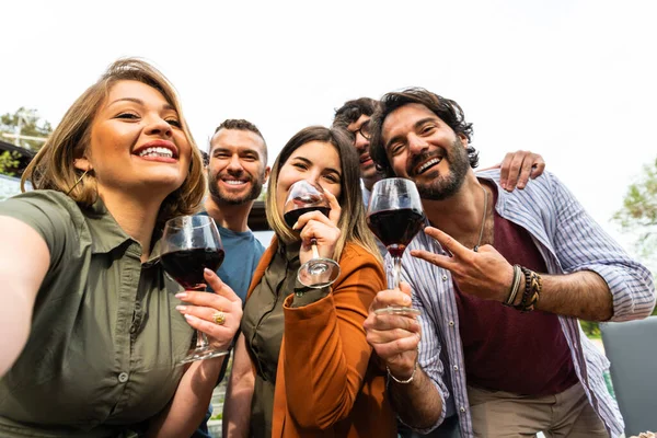 Happy Group Friends Taking Selfie While Toasting Red Wine Group —  Fotos de Stock