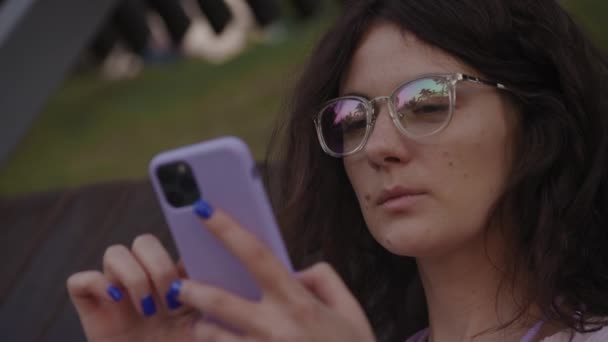 Curly Woman Glasses Browsing Smartphone Close Caucasian Female Student Online — Vídeos de Stock