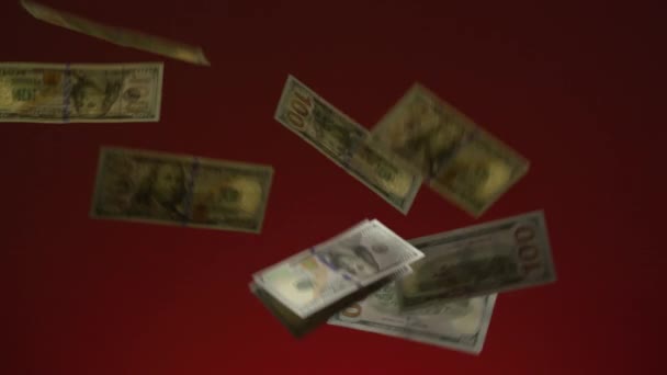 Fallande Pengar Röd Bakgrund Regn Pengar Hundra Dollar Sedel Riktigt — Stockvideo