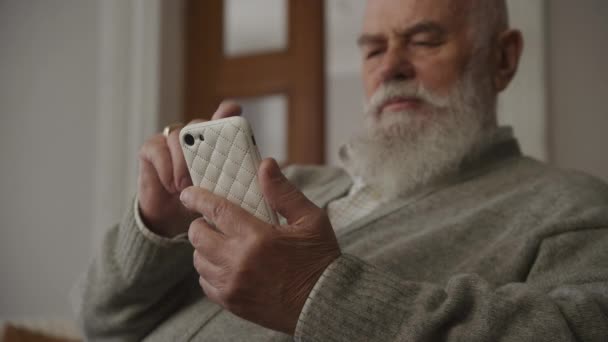 Grandfather Using Smartphone Selior Man Hold Smart Phone Close — Stock Video