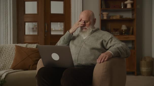 Exhausted Grandfather Armchair Using Laptop Senior Man Face Palm — Wideo stockowe