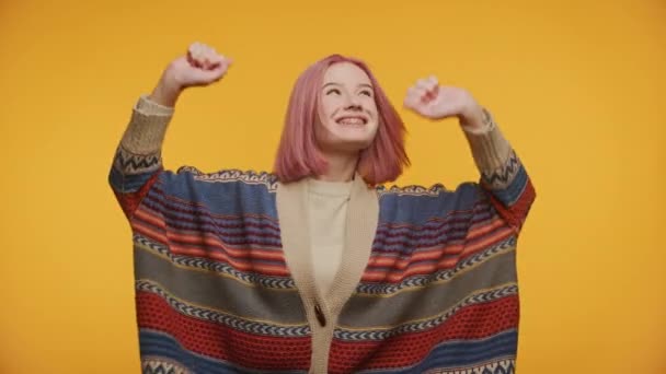 Woman Celebrating Achievement Dance Yellow Background — Stock Video