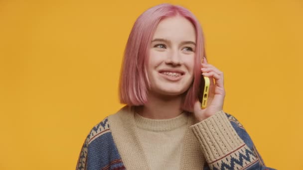 Woman Phone Call Conversation on Yellow Background, Pink Hair Young Lady Talking Using Smartphone