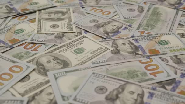 Scattered Hundred Dollar Bills Desk — Stock Video