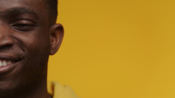 Close Cheerful Young Black Man Vibrant Smile Half His Face — Vídeo de Stock