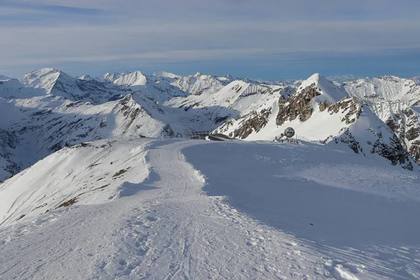Sportgastein tourist area in Austria. Alpine snowy landscape. Amazing panorama of rocky mountains in winter. Snowy mountain peaks.