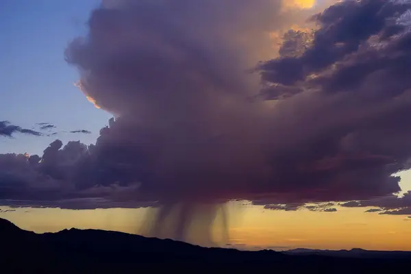 Stock image A huge evening summer monsoon mature thunderstorm both dangerous and beautiful rumbles over Prescott Arizona in the southwestern USA