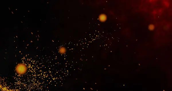 Siyah arka planda yangın ya da toz. Siyah arkaplanda kıvılcımlar