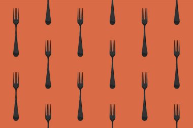 Desen. Kırmızı turuncu arkaplanda çatal üst görünümü. Yüzeye başvurmak için şablon. Yatay görüntü. Düz yatıyordu. 3 boyutlu görüntü. 3B görüntüleme.