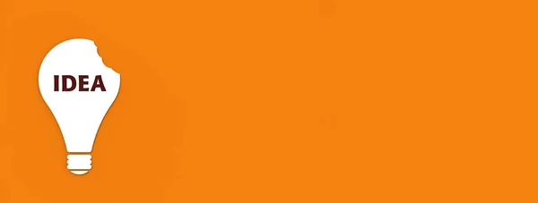 Bílá Pokousaná Žárovka Nápadem Nápis Oranžovém Pozadí Otisky Zubů Kradou — Stock fotografie
