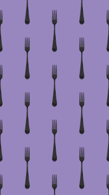 pattern. Fork top view on pastel violet background. Template for applying to surface. Vertical image. Flat lay. 3D image. 3D rendering.
