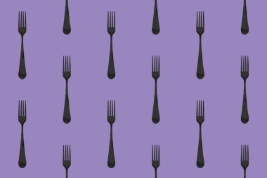 pattern. Fork top view on pastel violet background. Template for applying to surface. Horizontal image. Flat lay. 3D image. 3D rendering.