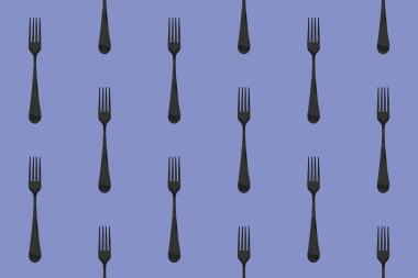 Desen. Pastel mavi arkaplanda çatal üst görünümü. Yüzeye başvurmak için şablon. Yatay görüntü. Düz yatıyordu. 3 boyutlu görüntü. 3B görüntüleme.