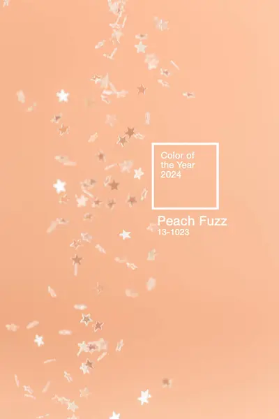 Peach Fuzz renginde kayan yıldız parıltısıyla soyut minimalist arkaplan - 2024 yılının rengi.