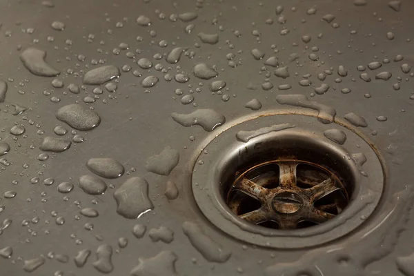 stock image Drain in a metal sink
